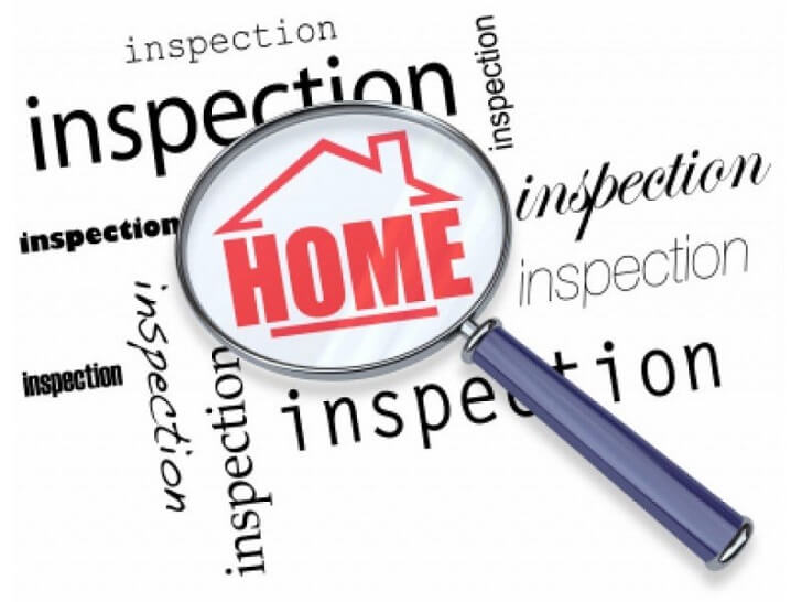 Home inspection sign with magnifying glass